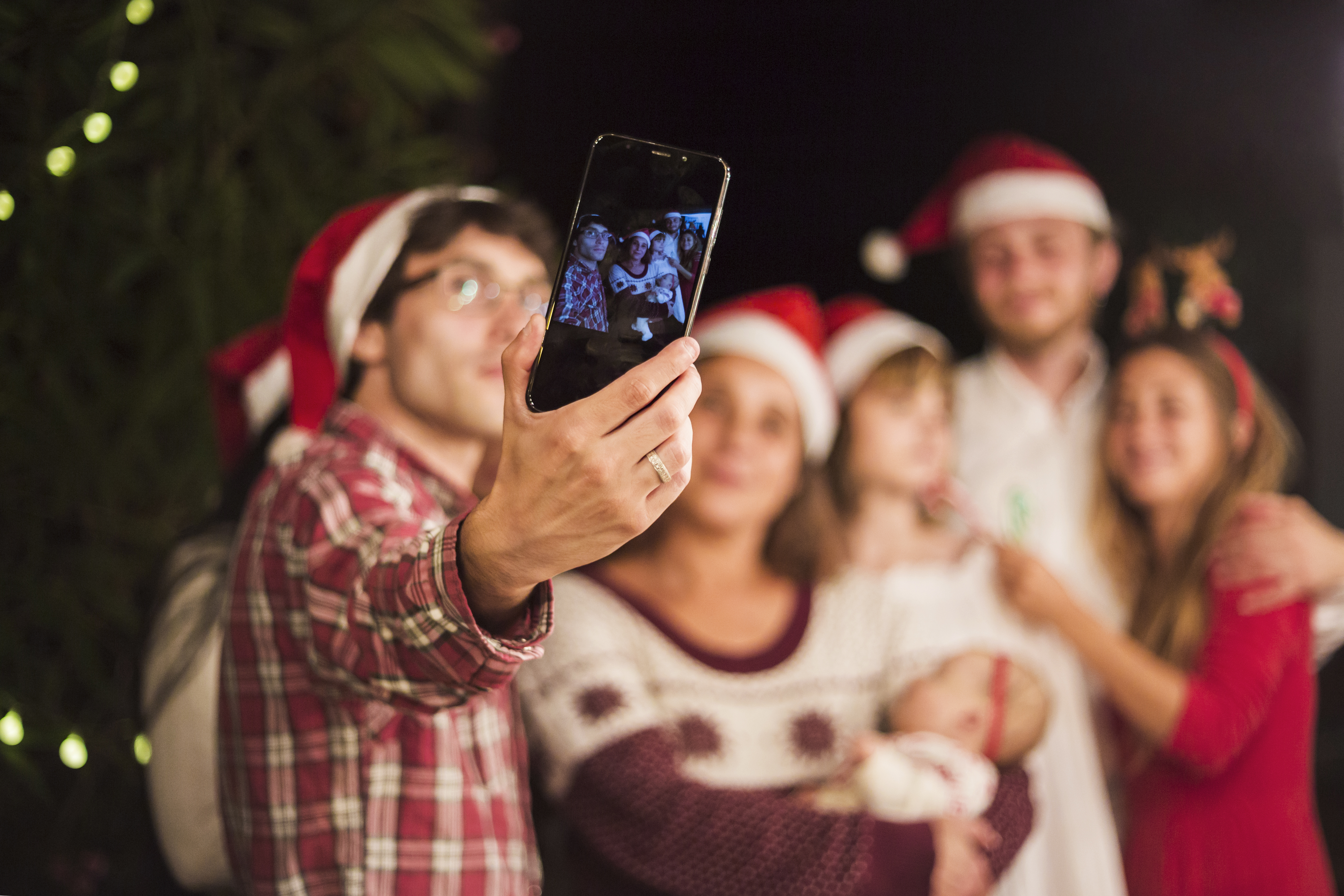 friends-making-selfie-christmas-party