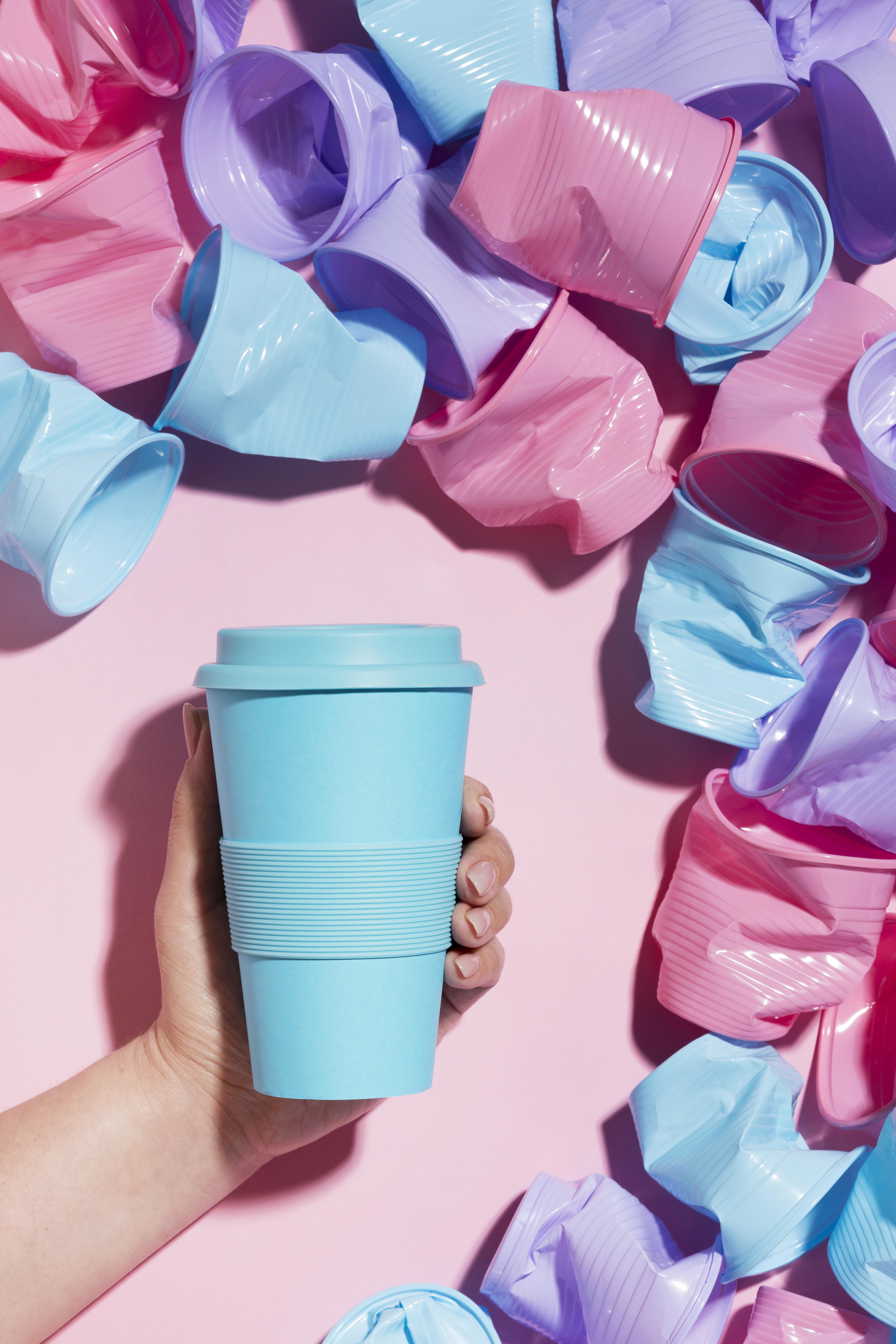 hand-holding-reusable-cup-plastic-cups